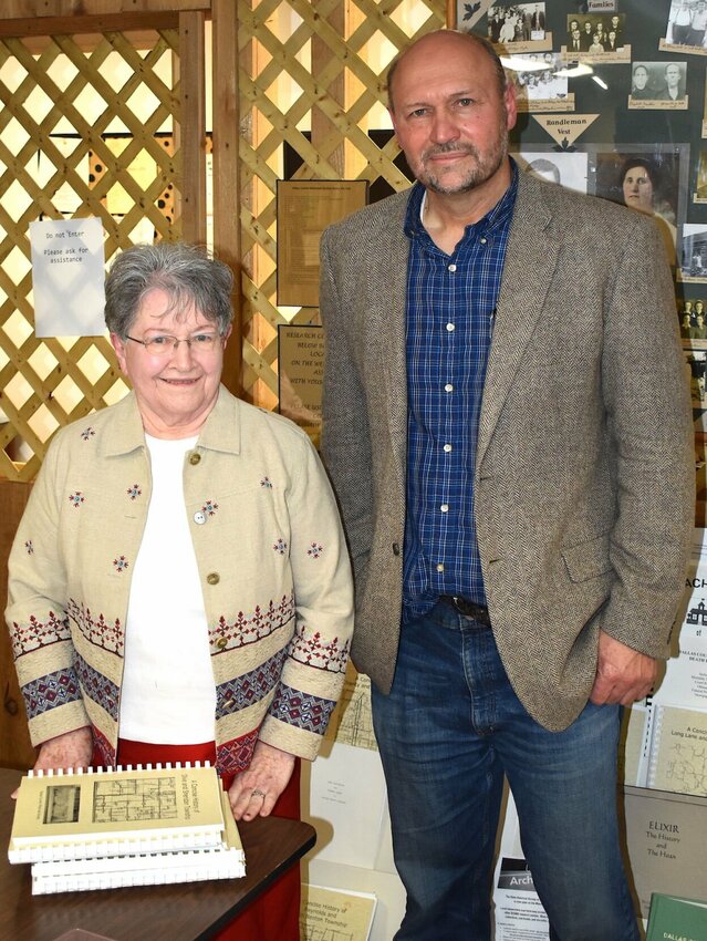 Linda Crawford, Dallas County Historical Society president, is pictured with Dr. Phillip Howerton.   Photo by Jim Hamilton
