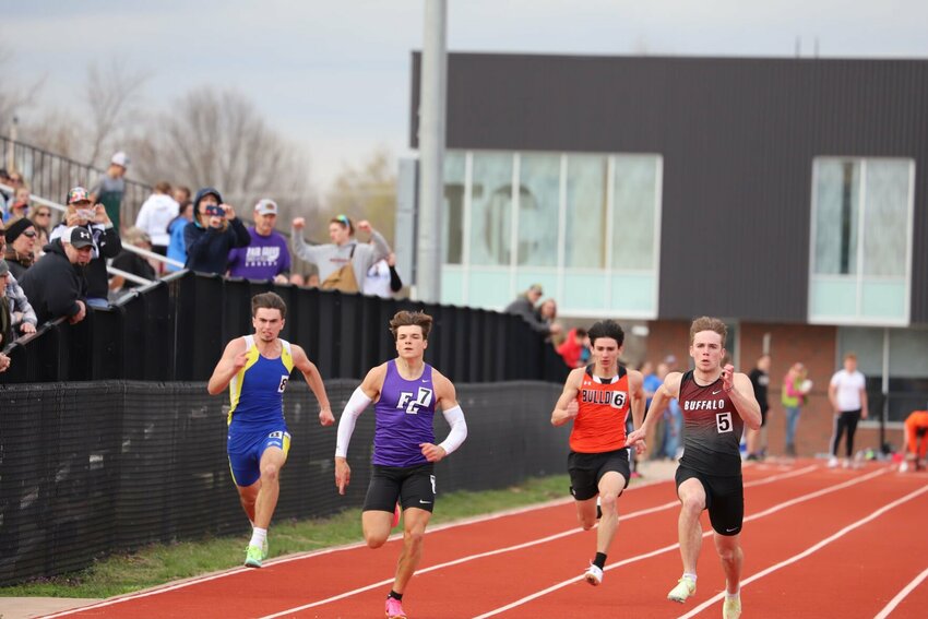 Buffalo&rsquo;s Brett Schwanke, right, won both the 100- and 200-meter dashes at the Buffalo meet. Fair Grove&rsquo;s Canyon Crowley, second from left, finished second in both events.   Reflex photo by Melissa Green
