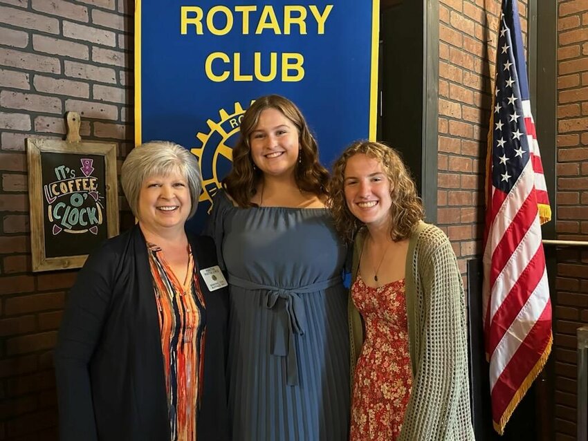 Rotarian Martha Lewis, O&rsquo;Bannon Bank, poses with two of the local attendees of the Rotary Youth Leadership Awakening (RYLA) camp, Jorja Harrison and Leah Stitt.