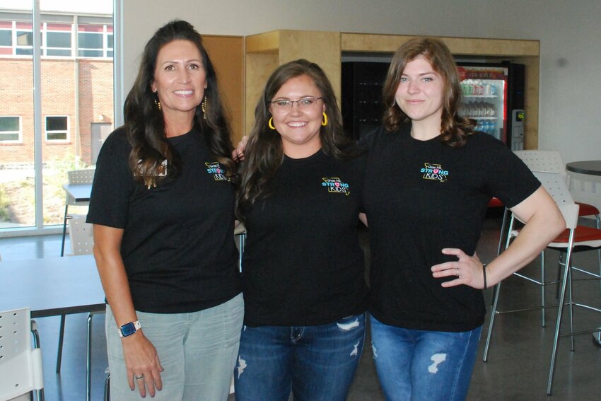Local healthcare workers from CMH Family Medical Center showing their support in the Show Me Strong Kids t-shirts.