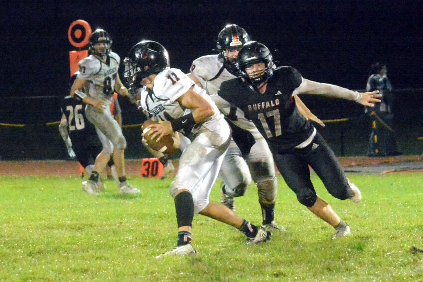 Ben Foree (17) chases an opposing quarterback in a recent game. Foree has been outstanding both on defense and offense this year.