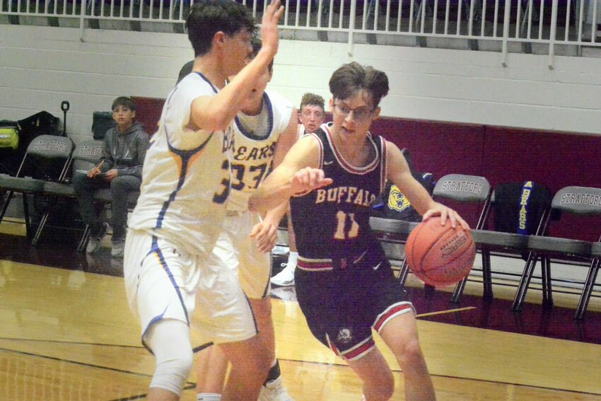 Carson Shepperly drives to the basket against Ava.