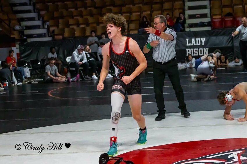 Aiden Patrick gets excited after defeating an opponent from Reeds Spring.
