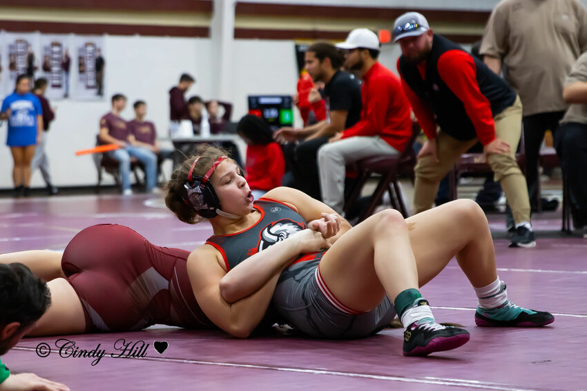 Aja Watson has this opponent under control as she did most of the time when she won five of six matches to take second place at the Lady Mustangs Christmas Clash wrestling tournament.