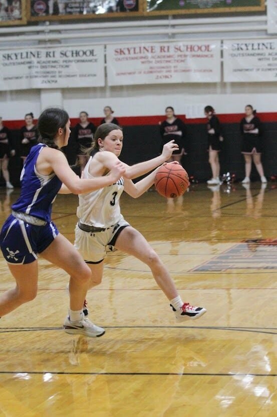The always-hustling Shelby Redd races to get by a Boonville defender.