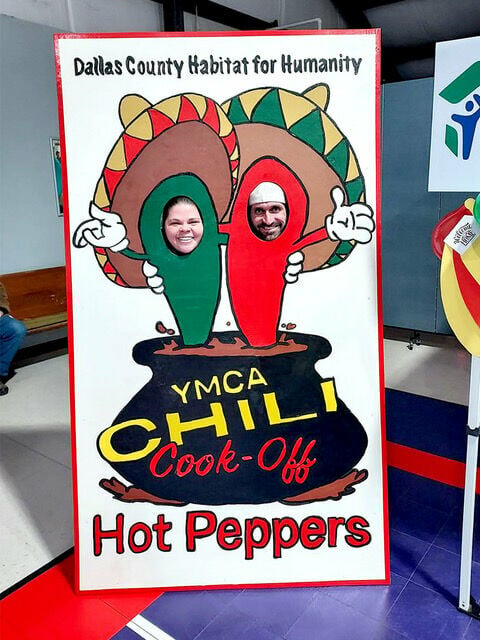 Chelsea Kirchberg's whimsical photo booth added to the festive atmosphere at the YMCA Chili Cookoff.