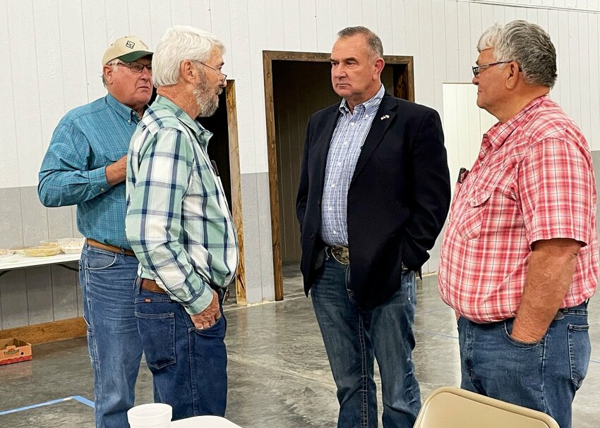 Missouri Lt. Governor Mike Kehoe takes some time to talk with Dallas County Commissioners at the Dallas County Cattlemen&rsquo;s Association meeting on Tuesday, March 12. Pictured are, from left: John Crawford, Roger Bradley, Kehoe and Mike Lewis.