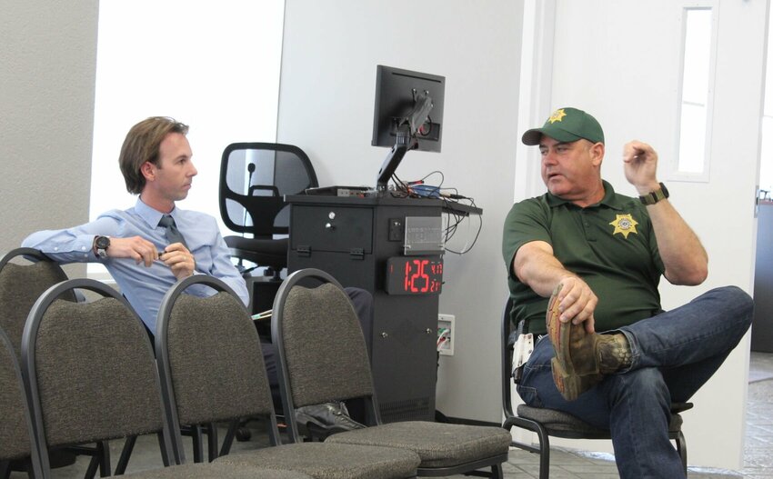 Duane Hamilton, 911 director, and Sheriff Scott Rice discuss details of the FEMA Community Shelter.