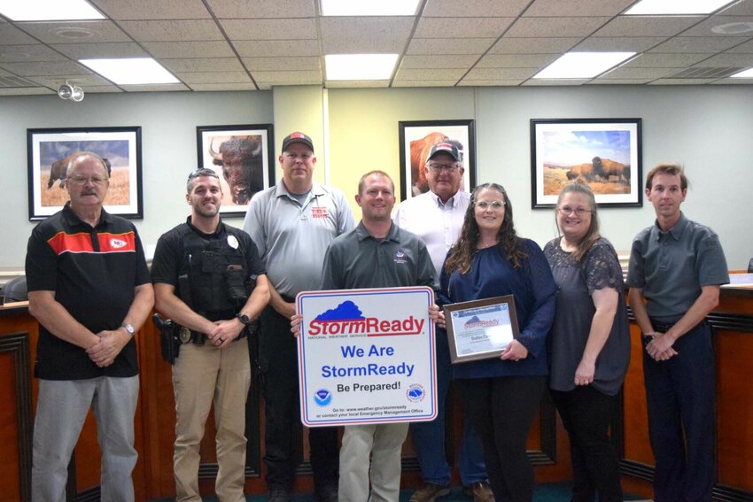Pictured are, from left: Terry Lane, Alderman; Chad Garner, Buffalo Chief of Police; Greg Cunningham, Buffalo City Fire Chief; Mark Burchfield, NWS Forecaster; John Crawford, Dallas County Presiding Commissioner; April Garrett, Director of DCEM; Tara Swanigan, Deputy Director of DCEM; and Duane Hamilton with Dallas County 911.