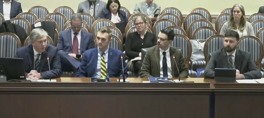 Caroline County Commission President Travis Breeding, left, testifies in favor of House Bill 717 during a Feb. 12 hearing of the Environment and Transportation Committee in Annapolis.
