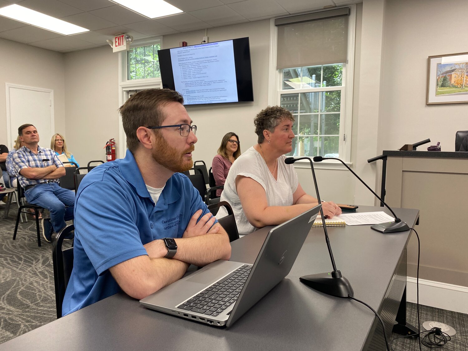 Caroline County Deputy County Administrator and Finance Director Daniel Fox and Grant Coordinator Stacy Seward present the final budget and fee schedule to the County Commissioners at their June 10 meeting.