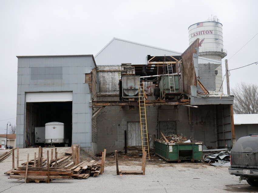 The old feed mill on the corner of Front and Broadway in the process of being dismantled.