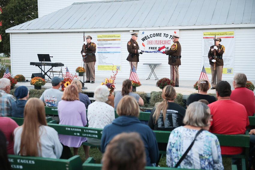 The Vernon County Sheriff’s Honor Guard performs a ceremonious flag folding at the 9/11 tribute in Viroqua on Sept. 11. The Honor Guard included Deputy Don Krzewinski, Sergeant Jake Johnson, Deputy William Zirk, and Detective JoEllen Egge.