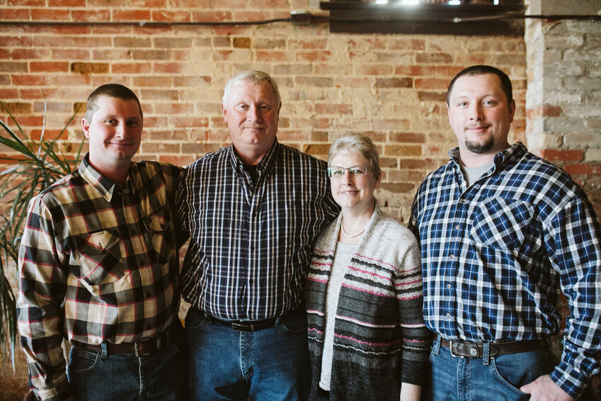 The Evans Family: Nick, Randy, Lynn, and Brad. The Evans matriach, Lynn, 
lost her battle with stomach cancer last month on Sept. 21. Contributed photo.