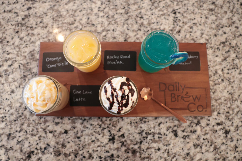 The drinks include fun names like Orange ‘Cone’sicle, One Lane Latte, Rocky Road Mocha, and Blue Raspberry Roundabout. Record photo by Logan Everson.