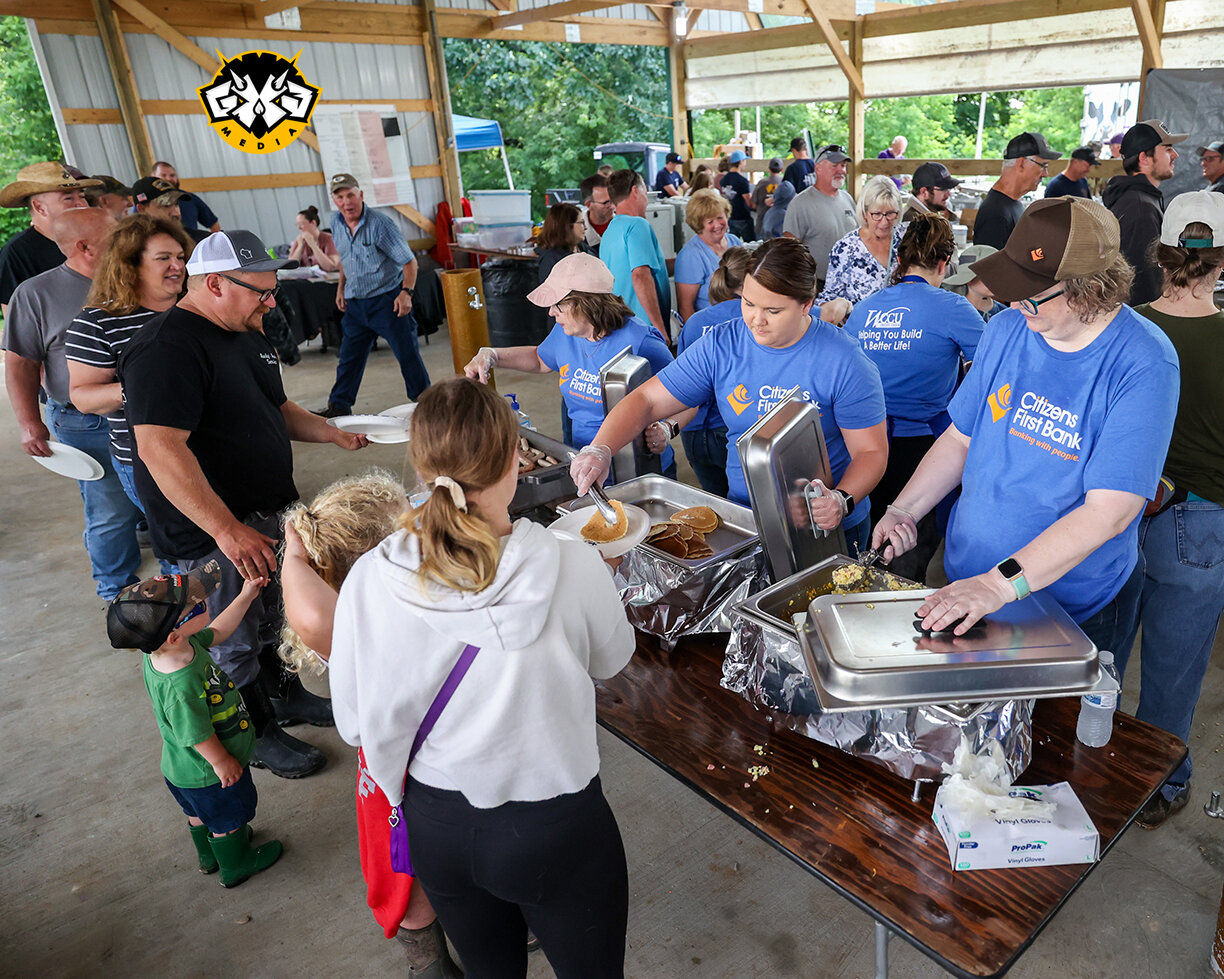 Over 2,000 people enjoy Vernon County Dairy Breakfast in spite of wet