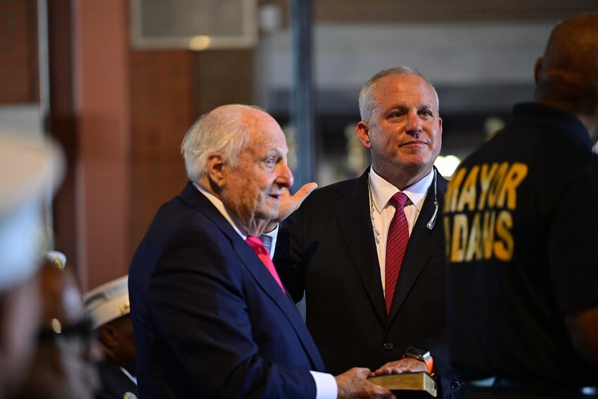 Robert Tucker being sworn in by Mayor Eric Adams. Tucker's father held the Bible on which Tucker swore the department’s oath. FDNY