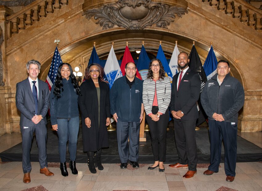 <p>Lenin Fierro, the director of fleet safety and Vision Zero initiatives for DCAS Fleet Management, was among the first city employees to succumb to complications from Covid. Fierro, a 10-year Navy veteran, is pictured, far right, during a Veterans Day event at Surrogate’s Courthouse. His daughter, Destiny, joined the department last month.</p>