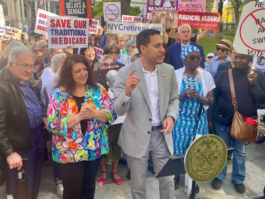 <p>Council Member Christopher Marte at an Oct. 23 rally at which he announced legislation that would preserve city retirees’ current health benefits. Delegates from the city’s largest public-sector union, DC 37, voted to withdraw the union's endorsement of a Council member supporting the bill. Marianne Pizzitola, the president of the NYC Organization of Public Service Retirees, is at left.</p>