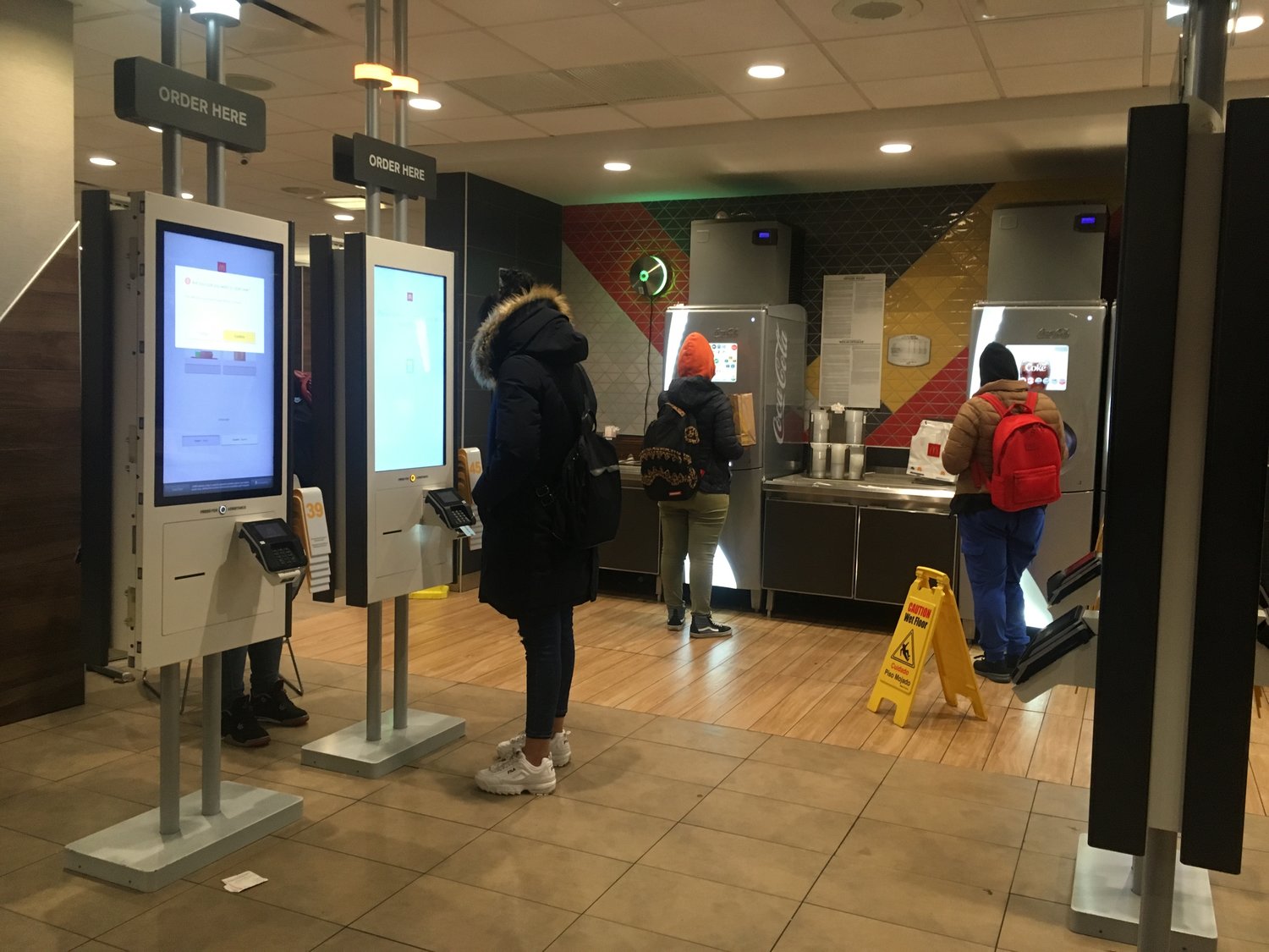 Self-serve kiosks, such as these at this McDonald’s on Chambers Street, are fast becoming features at fast-food restaurants. At a meeting of the City Council's Committee on Civil Service and Labor last week, advocates voiced concern that nearly half a million New York City jobs, the vast majority done by low-income employees, are highly susceptible to automation. They called on officials to set up more “bridge” programs to help those workers develop new skills.