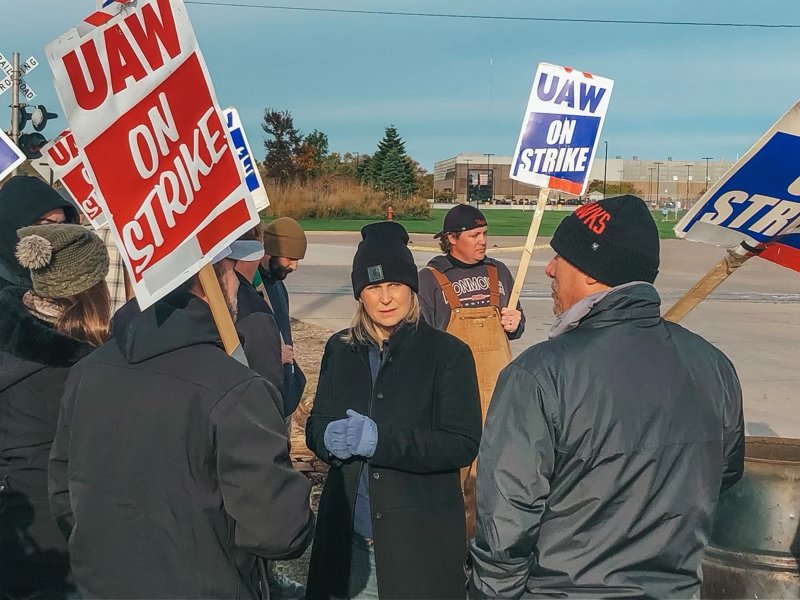 AFL-CIO President Liz Shuler, pictured on a picket line with striking John Deere workers in November, earlier this month cited her own experience in the International Brotherhood of Electrical Workers to note the collaboration between that union and employers 'who invest in a pipeline of talent...because they know they want the highest-quality, most highly-skilled, trained workforce that you can find.'