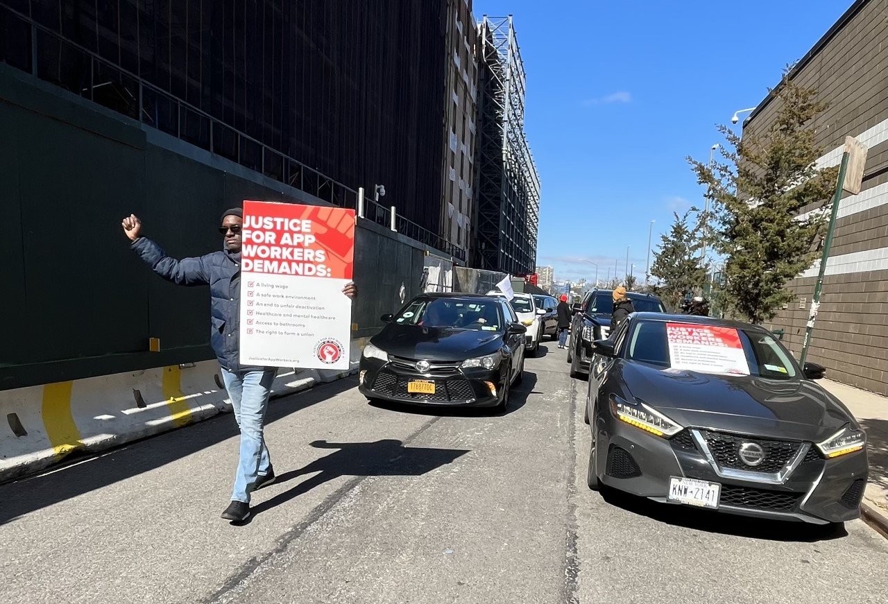 Aziz Bah leads a procession of cars during a Justice for App Workers’ caravan from Fort Greene, Brooklyn to Uber Headquarters in Manhattan.