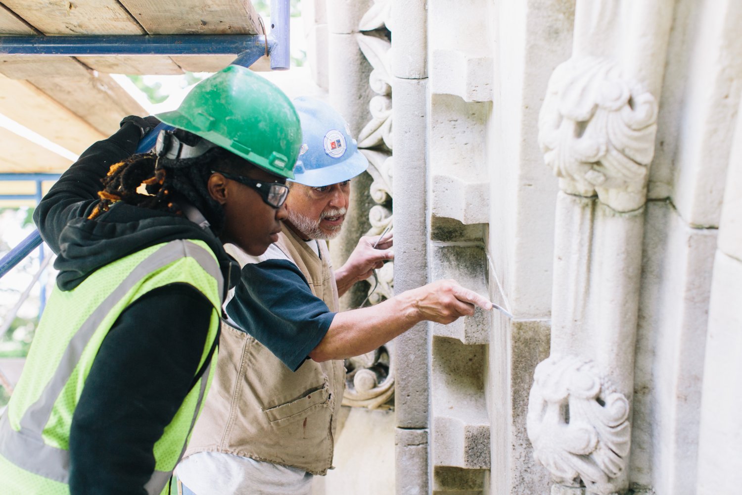 The Bridge to Crafts Careers Program, launched by the World Monuments Fund in 2015 at Woodland Cemetery in the Bronx, gives a selected group of interns the opportunity to learn masonry cleaning, conservation and maintenance techniques, along with a possible career track. The program expanded to Green-Wood Cemetery in Brooklyn a few years later. Above, a master craftsman instructed one of the program’s participants at Green-Wood in 2018.