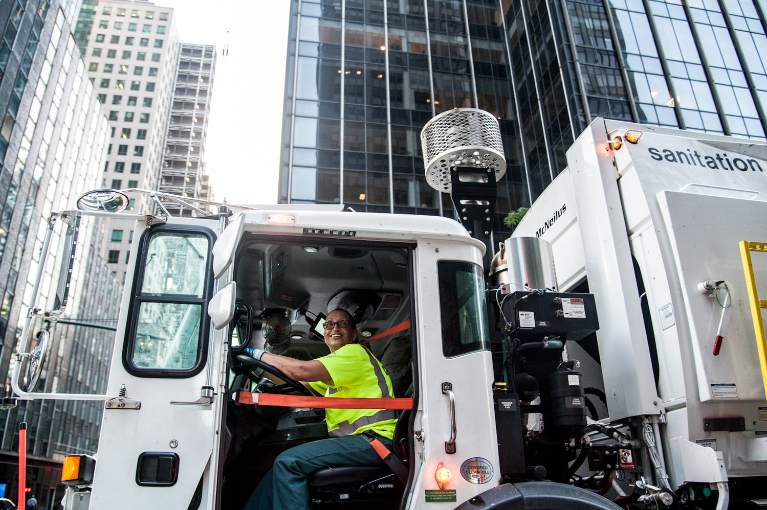 For the first time in seven years, the city will hold an exam for sanitation workers. Above, Dawn Kaye, a SanWorker with the Manhattan 6 garage, worked her trash pickup route in Midtown East in 2019.