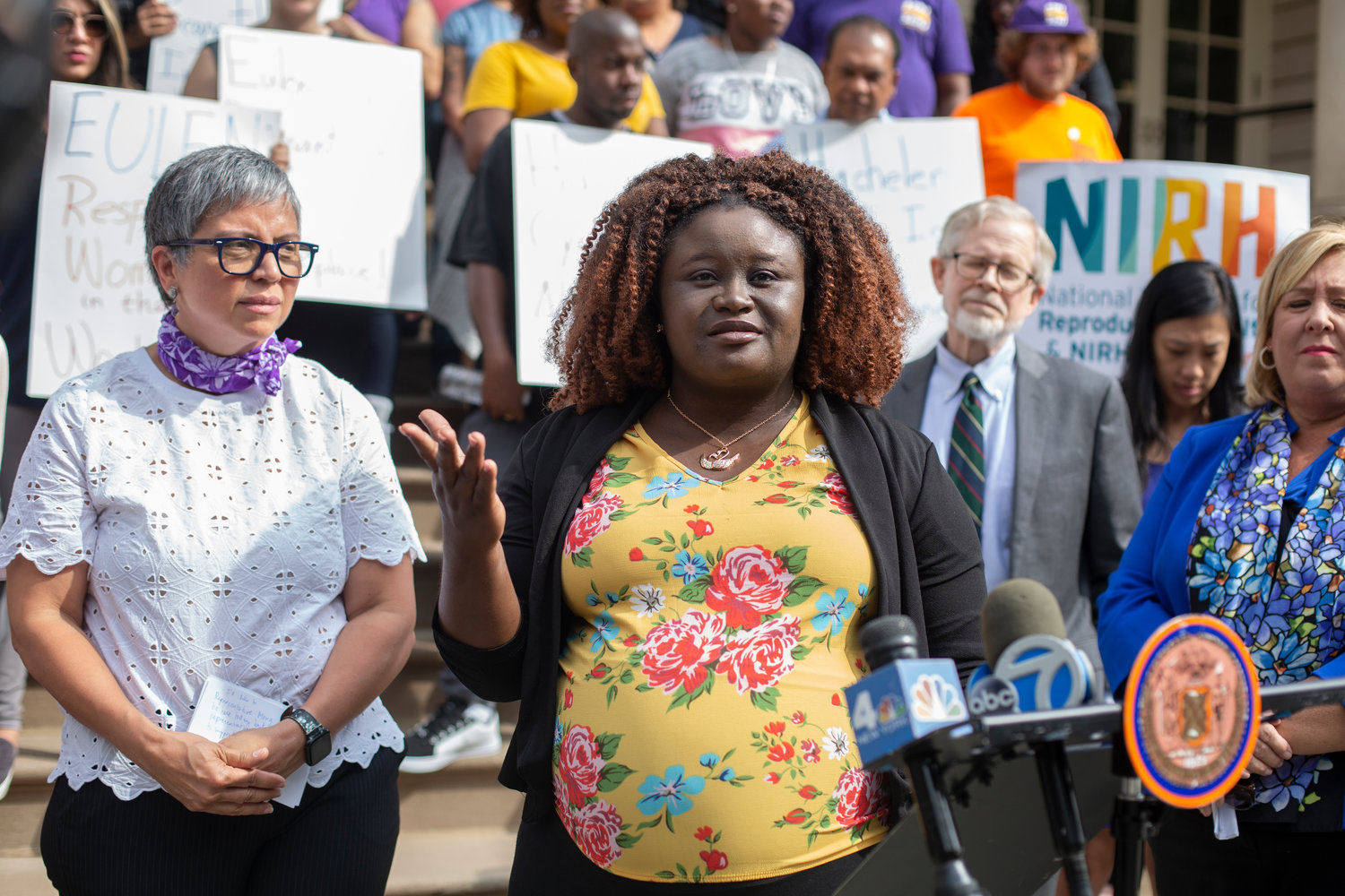 Advocates rallied at City Hall in 2019 in support of Hacheler Cyrille, pictured, who filed a pregnancy discrimination lawsuit against her employer. Organizations advocating for workers' and women's rights called for the passage of legislation that would make it illegal for employers to deny reasonable accommodations for pregnant workers, outside of Senator Chuck Schumer's Midtown office July 13.