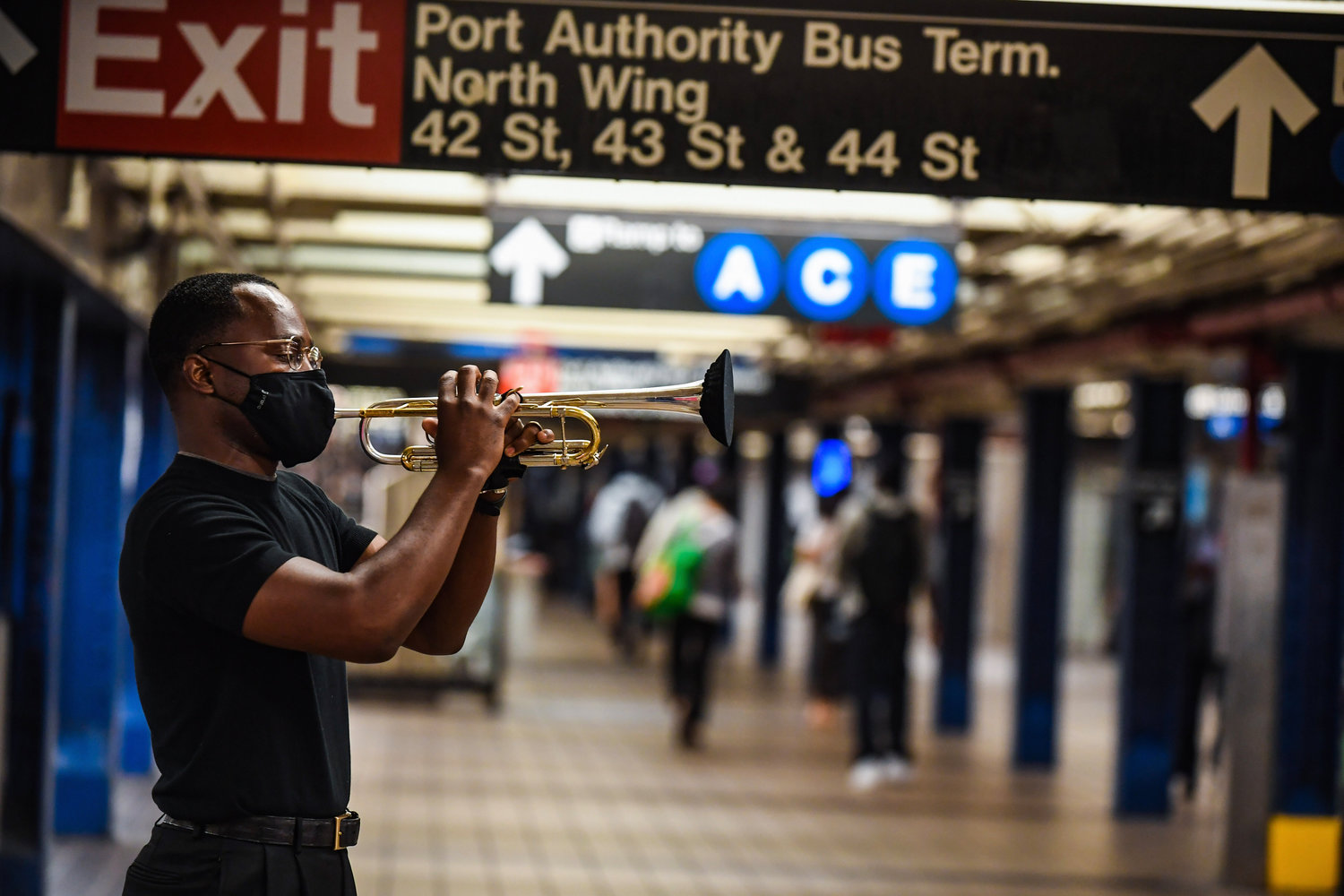 Trumpeter Eganam Segbefia at played his instrument at the 42nd Street/Port Authority station. After a 15-month hiatus because of the pandemic, the MTA’s Music Under New York program returned to the subway system in early June 2021.