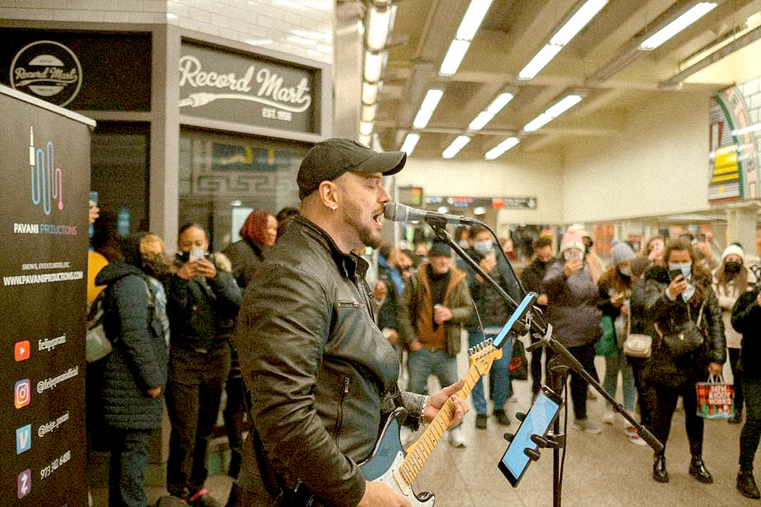 Felipe Pavani is a Brazilian subway busker who was first selected to the MTA "Music Under New York" program in 2017. He has been performing rock & roll hits in New York subway since then, often attracting sizable crowds at busiest spots including Time Square and Herald Square.