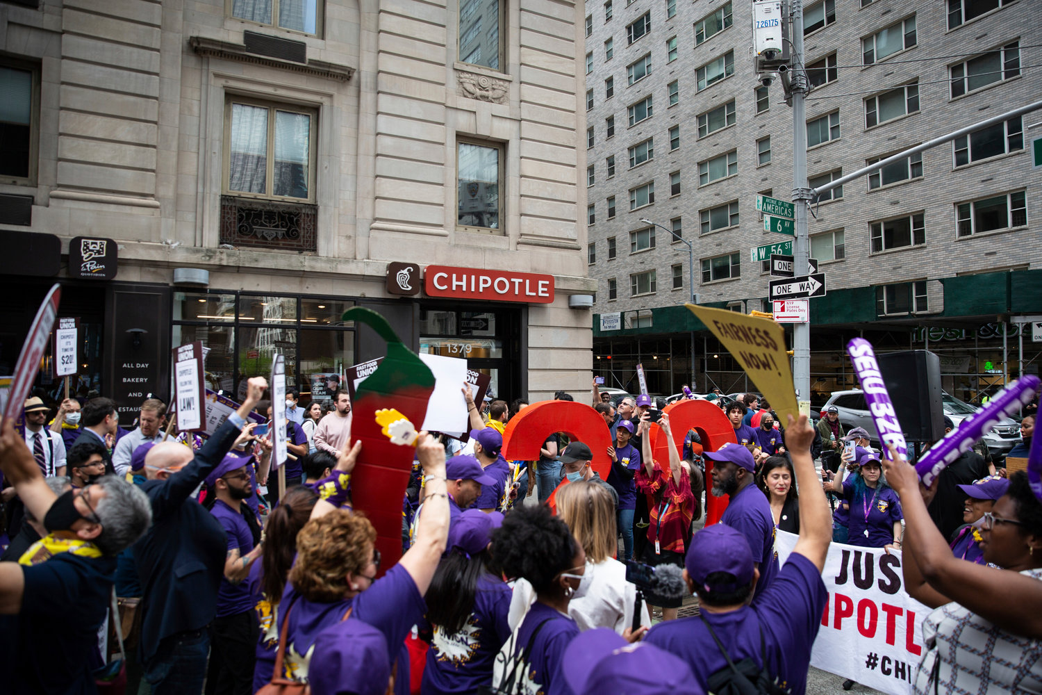 Current and former Chipotle workers rallied with elected officials along Sixth Avenue in Manhattan in May for higher wages and fair workplace practices.