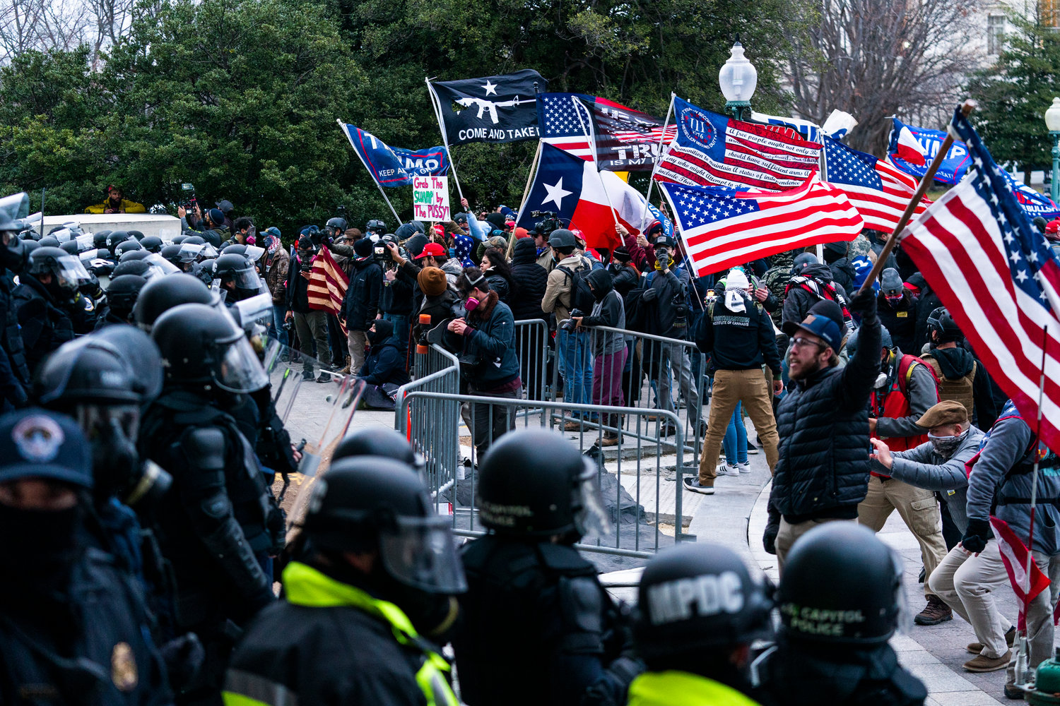 Insurrectionists loyal to President Donald Trump confronted U.S. Capitol Police officers outside the Capitol in Washington on Jan. 6, 2021.