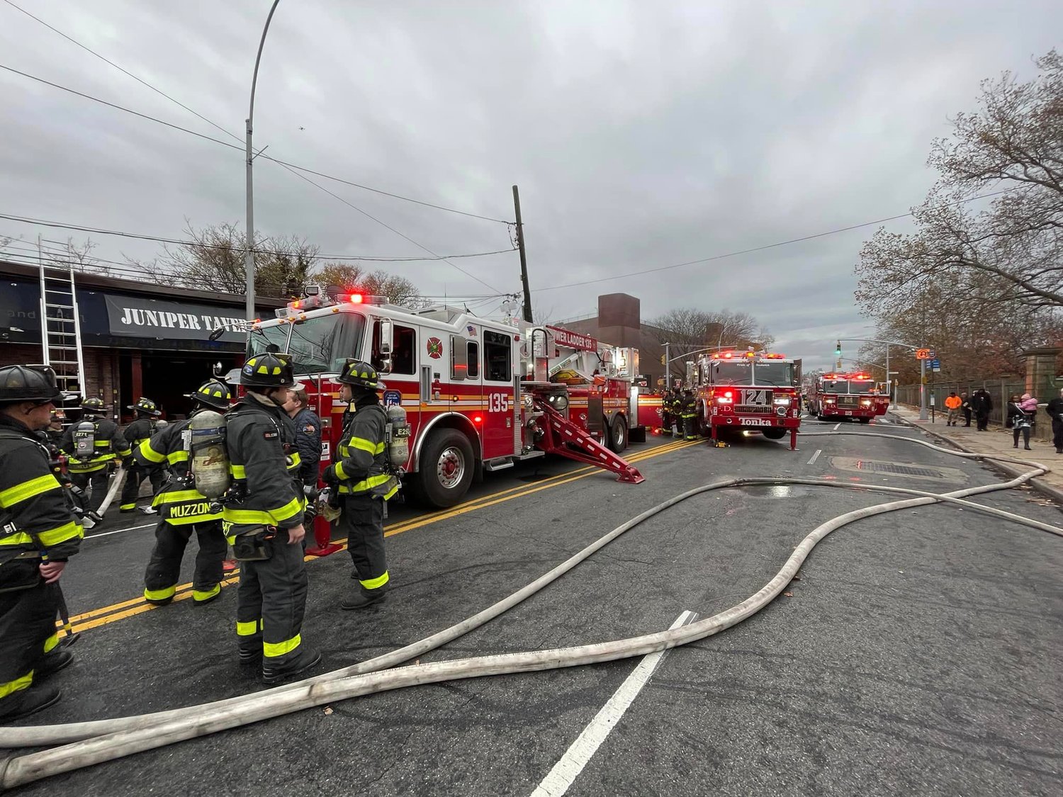 Firefighters at the scene of a 3-alarm fire on Metropolitan Avenue in Queens Nov. 30. A number of outages have beleaguered the FDNY’s emergency response system since the department’s computer-aided dispatch system went online last year. While an FDNY official said backups worked well, union heads said the outages have highlighted short-staffing.