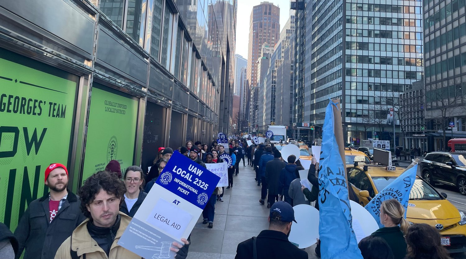 Legal Aid Society lawyers picketed outside of the nonprofit’s Water Street headquarters during a one-hour walkout over stalled contract negotiations earlier this month.