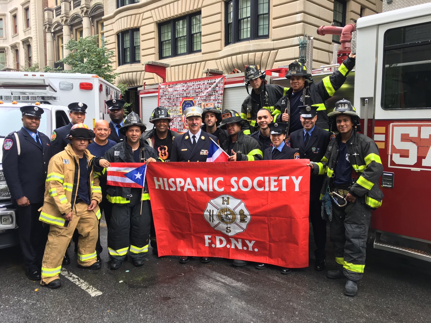 Members of the FDNY’s Hispanic Society during the 2017 annual Hispanic Day Parade along Fifth Avenue. The society’s president, Jose Prosper, at left, holding the Puerto Rican flag, recently said he does not sanction a threatened suit by the National Association of Hispanic Firefighters against the FDNY that alleges insufficient progress on diversity efforts.