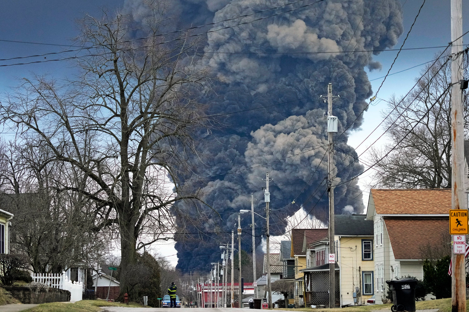 A plume rises over East Palestine, Ohio, as a result of the controlled detonation of a portion of the derailed Norfolk Southern trains Feb. 6.