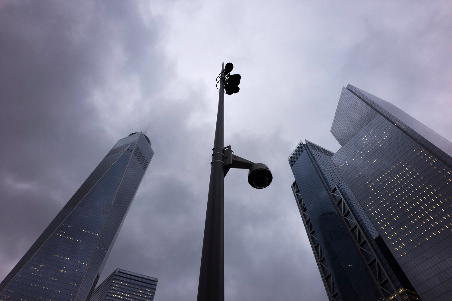 Surveillance cameras on a light pole at the World Trade Center.