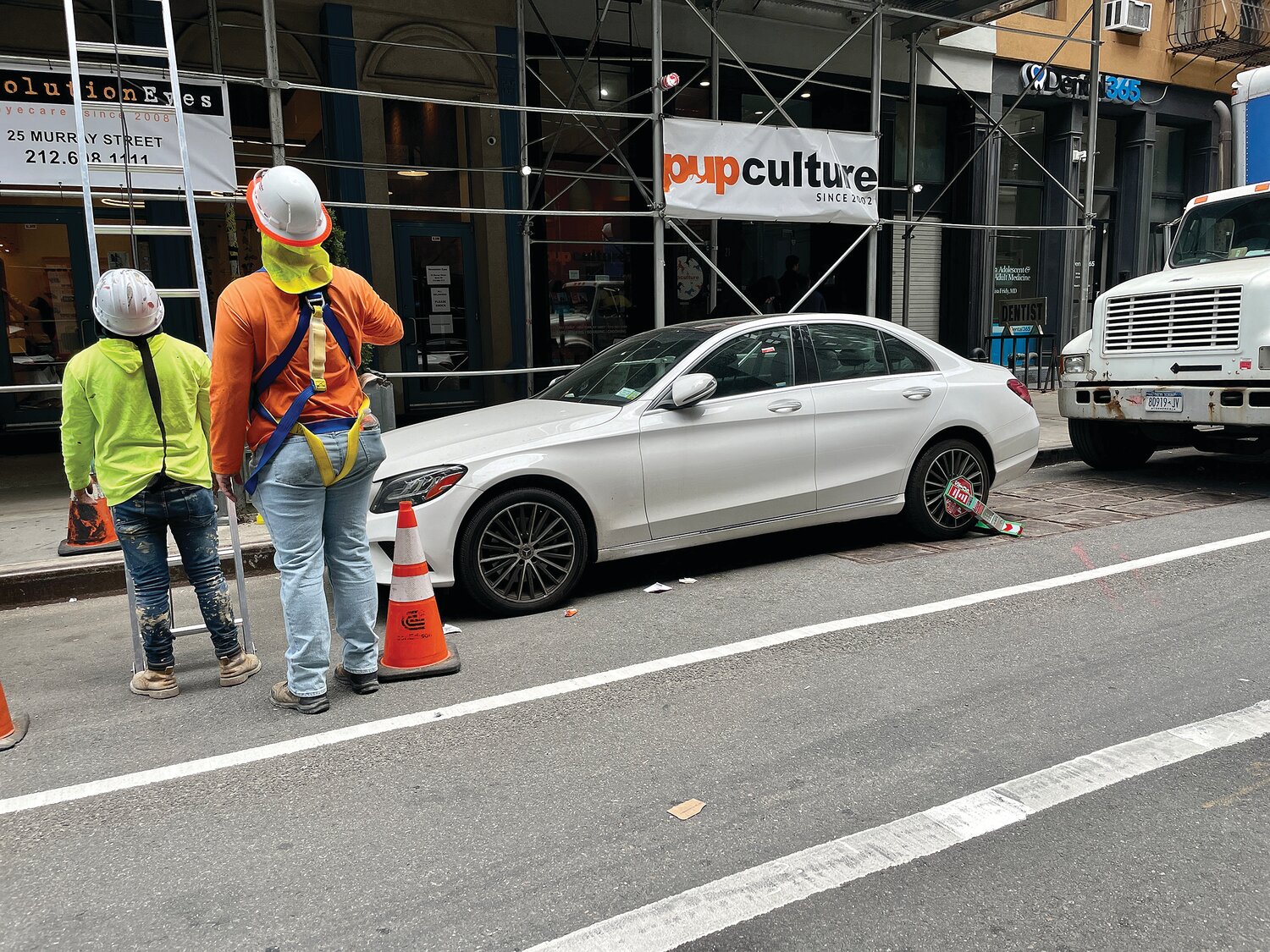A Mercedes sedan on Murray Street in Tribeca wears a boot. City Council legislation would levy parking fines based on offenders’ disposable incomes.