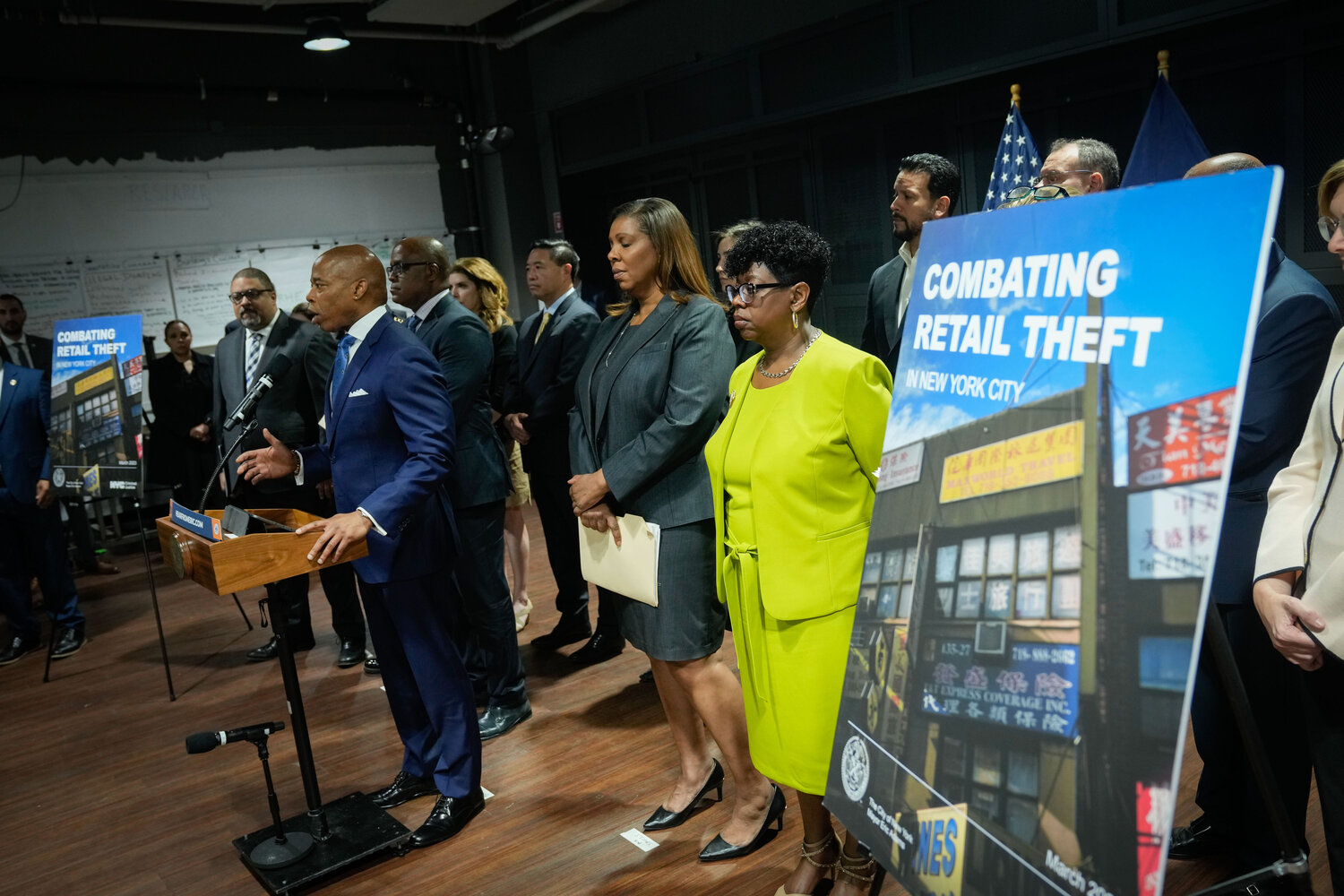 Mayor Eric Adams, together with state and other officials, announced a plan at the 125th Street Business Improvement District May 17 to combat retail theft across the five boroughs. To Adams’ right is Manhattan District Attorney Alvin Bragg and to his immediate left is state Attorney General Letitia James.