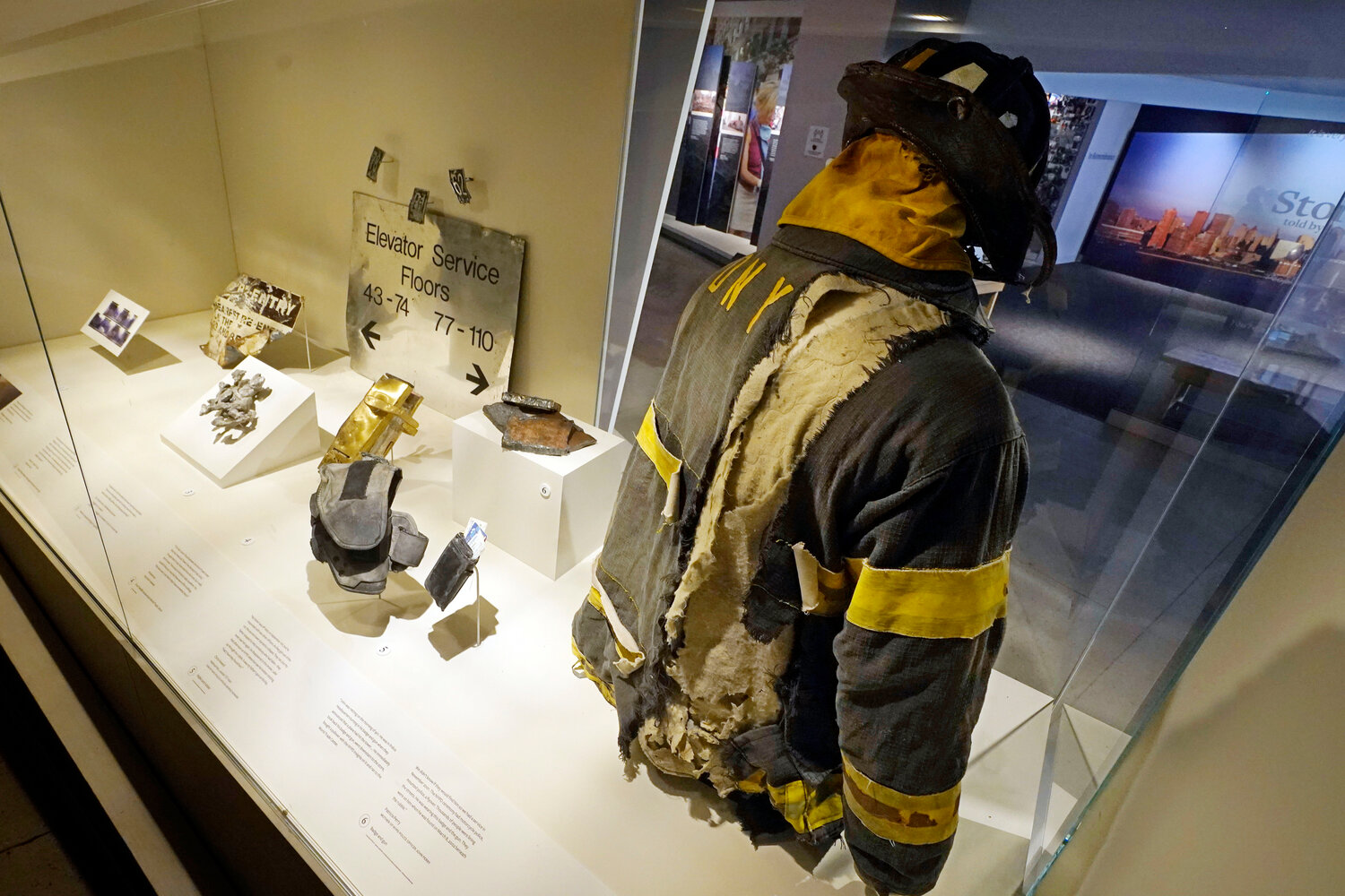 The helmet and turnout coat of a New City Fire Department firefighter, and other artifacts from the Sept, 11, 2001 attacks at the World Trade Center. The items were on display at the 9/11 Tribute Museum, which closed last year because of lack of funding. An exhibition at the New York City Fire Museum on view through the end of the month showcases some of the photographs, personal testimony and artifacts from the original displays on Greenwich Street.