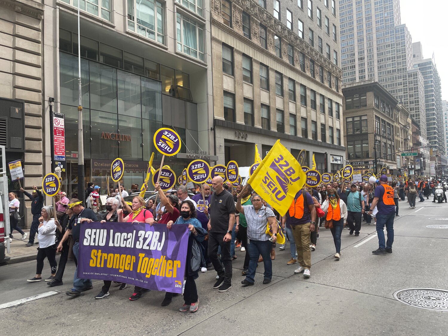 Hundreds of office cleaners belonging to Service Employees International Union Local 32BJ converged on Sixth Avenue near Bryant Park in June to kick off a contract campaign.