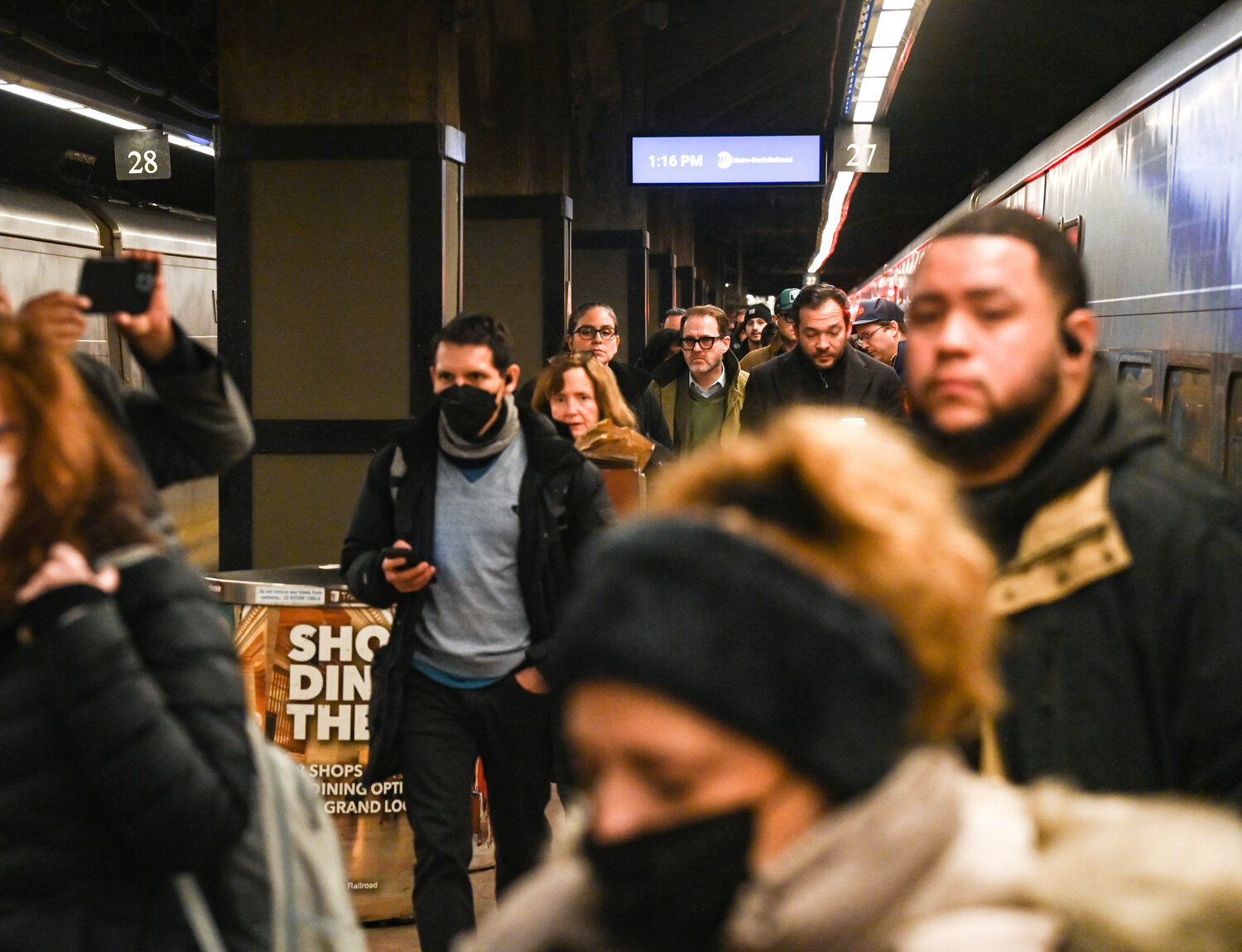 Metro-North Railroad commuters at Grand Central Terminal in February. The nation’s second-busiest commuter rail system and two Transport Workers Union locals have reached a tentative contract agreement covering about 600 train mechanics, inspectors, cleaners and cabinet makers.