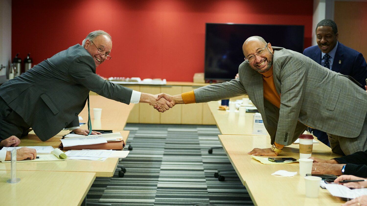 CUNY Chancellor Félix V. Matos Rodríguez shook the hand of District Council 37 Executive Director Henry Garrido after they reached a tentative contract agreement. The pact, announced Wednesday, provides 14.9 percent in compounded raises and a $3,000 ratification bonus.