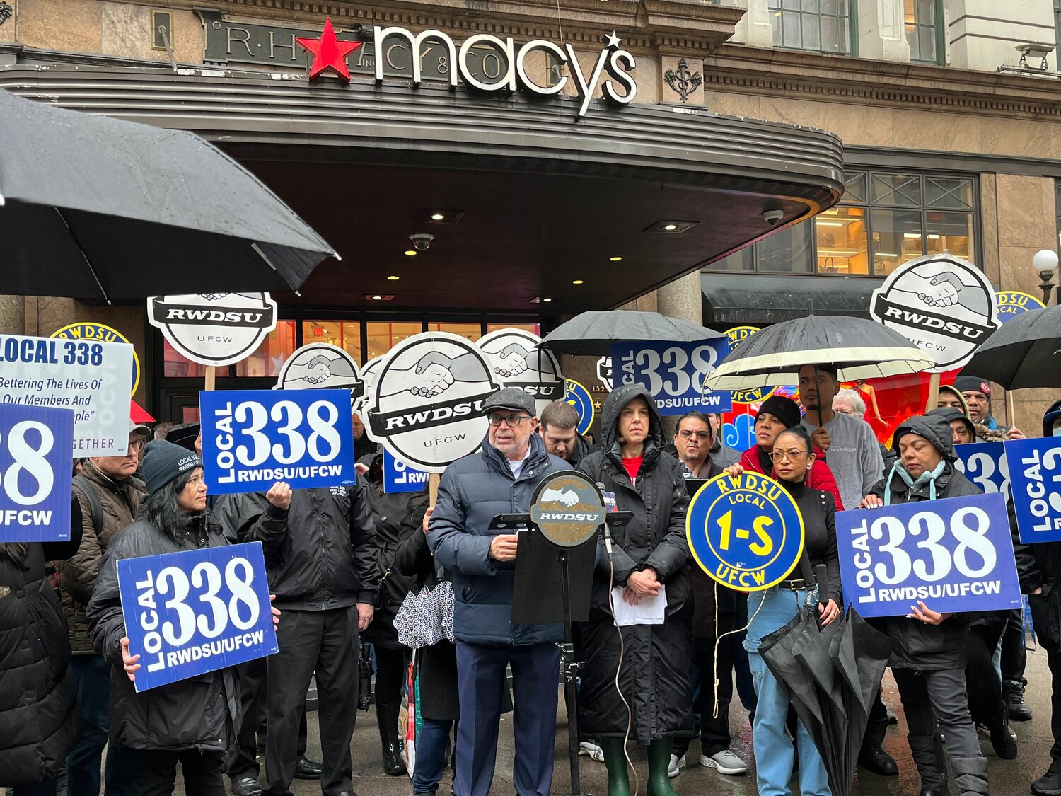 Stuart Appelbaum, center, the president of the 60,000-member Retail, Wholesale and Department Store Union, and other advocates spoke in favor of the recently introduced the Retail Worker Safety Act in front of Macy’s flagship location on 34th Street Thursday afternoon. The bill would require retail establishments with at least 10 employees to provide training and conduct risk assessments to protect retail workers.