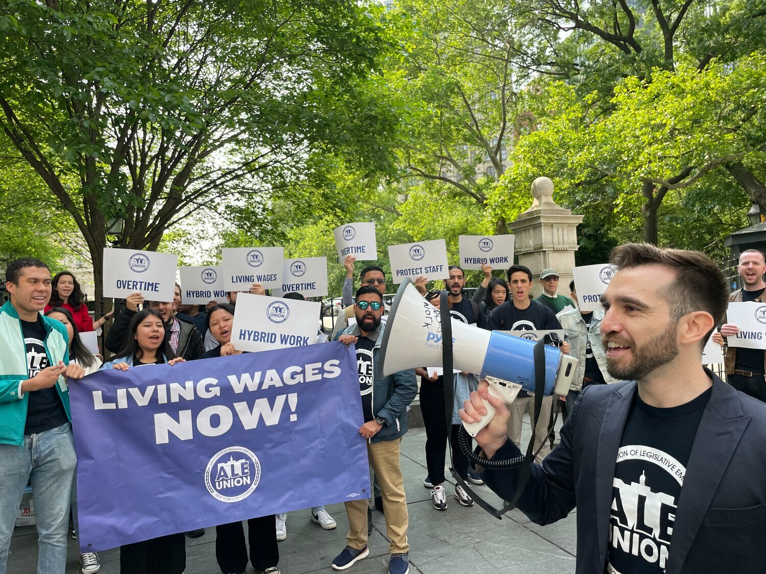 Members of the Association of Legislative Employees, including the union’s president, Dan Kroop, rallied outside City Hall last May to call attention to negotiations on a first contract with their City Council bosses. Kropp on Monday said the two sides are nearing an agreement.