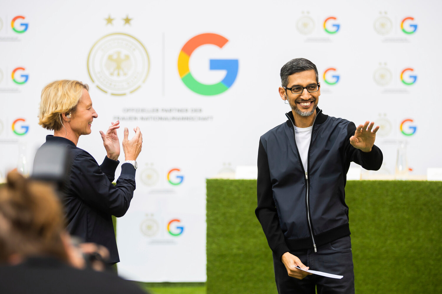 Sundar Pichai, CEO of Google and Alphabet, right, has referred to recent company layoffs as "removing layers to simplify execution and drive velocity in some areas.” He calls this "role elimination.”