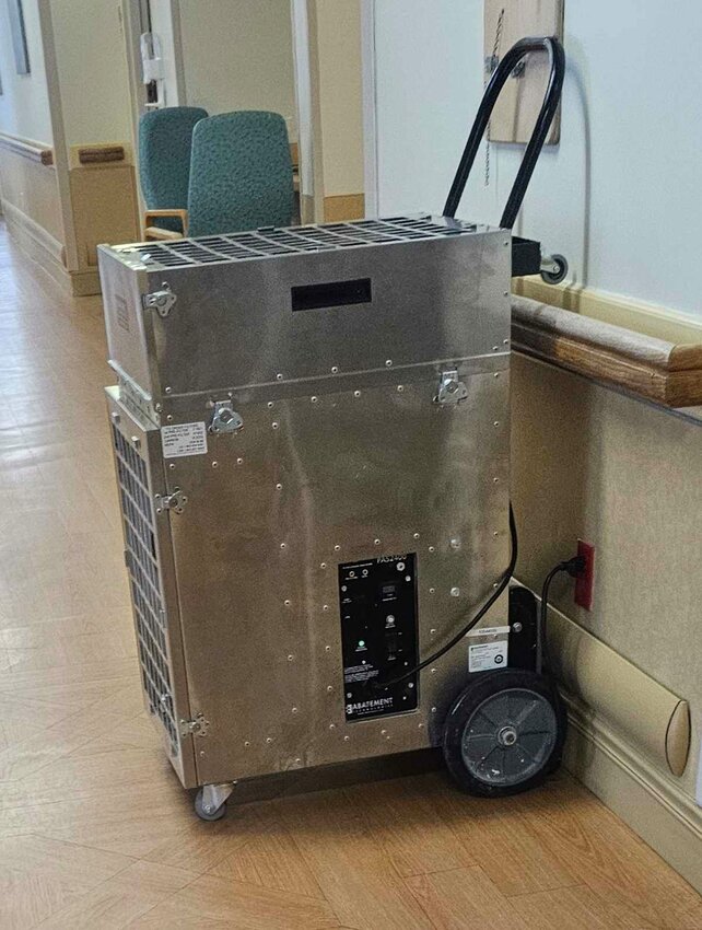 A high-power air purifier in the hallway at the State Veterans Home.