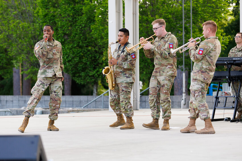 The 82nd Airborne Division All-American Rock Band plays a variety of hits during the 42nd annual Dogwood Festival on Friday, April 26, 2024.