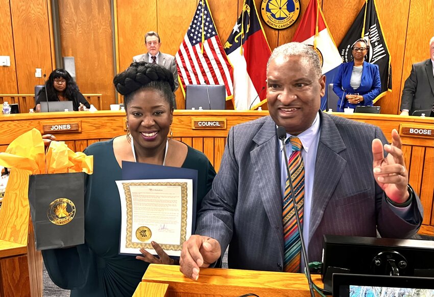 NaTasha Yvette Williams poses with Chairman Glenn Adams at the Feb. 19, 2024, meeting of the Cumberland County Board of Commissioners. Williams was honored with a proclamation from the board after winning a Grammy award earlier this month for her work in the Broadway musical 